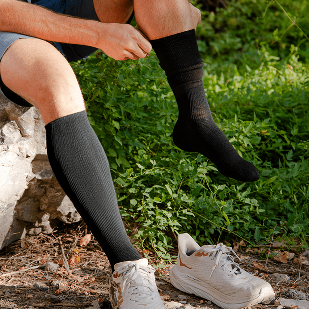 Black knee high socks put on for walking