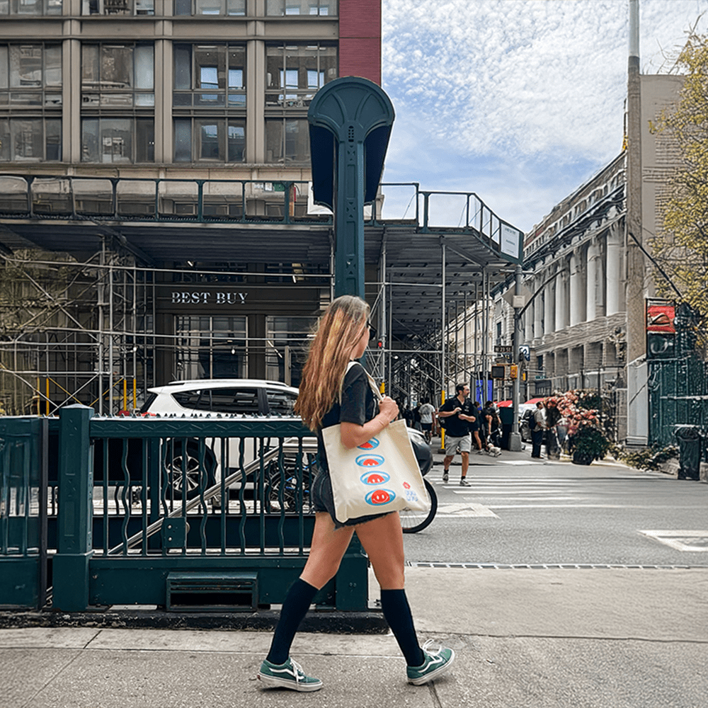 Woman with black pregnancy compression socks getting on subway