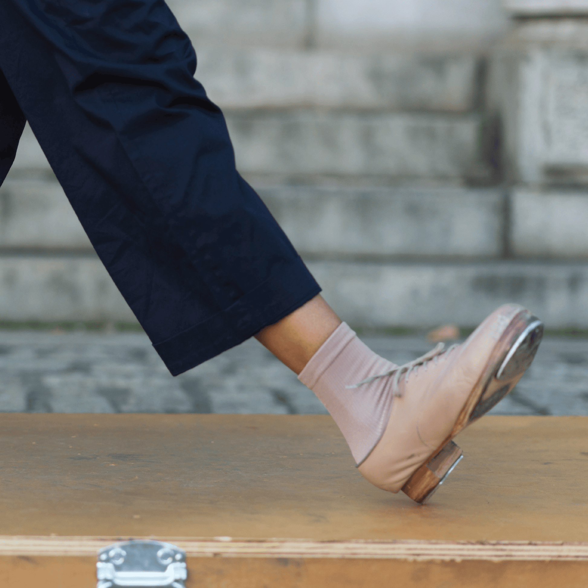 Crew compression socks with ankle support worn in tap shoes by woman