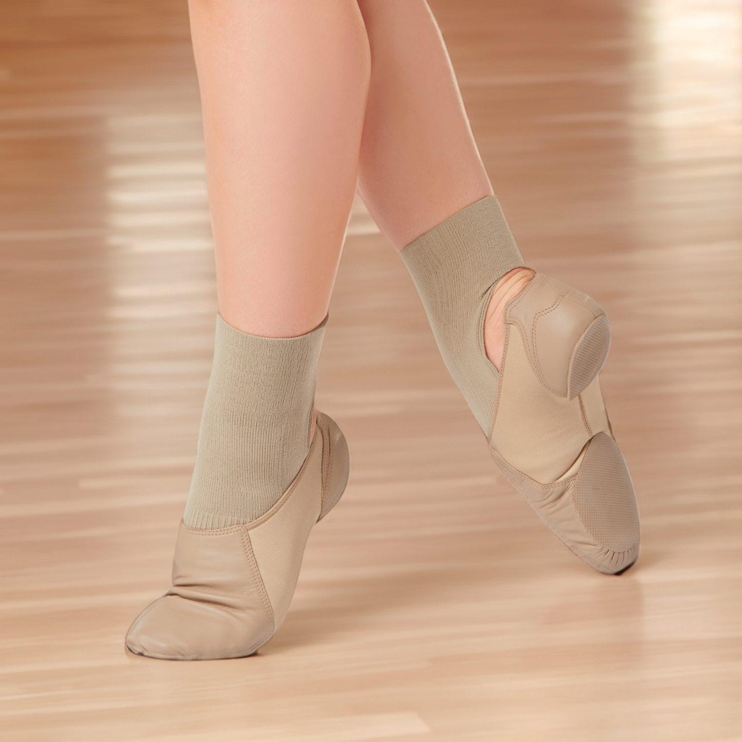 ballerina shoes with arch support worn by girl practicing in the dance studio