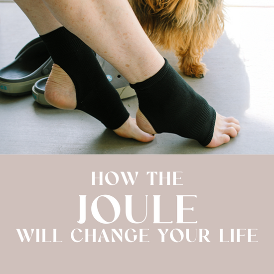 Ankle compression sleeve for women with ankle support being modeled